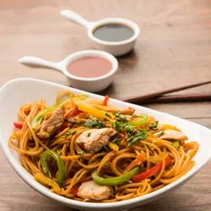 Chicken Hakka Noodles tossed with fresh peppers at Garam Masala Indian and Sweets, Edmonton