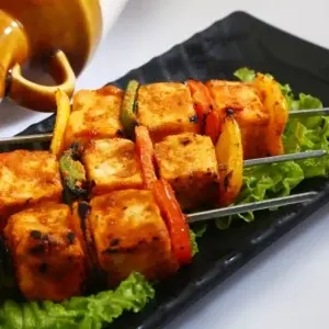Paneer Tikka skewers grilled with bell peppers at Garam Masala Indian and Sweets, Edmonton